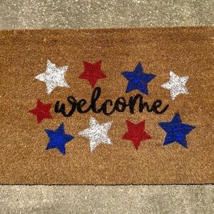 Welcome red white and blue door mat